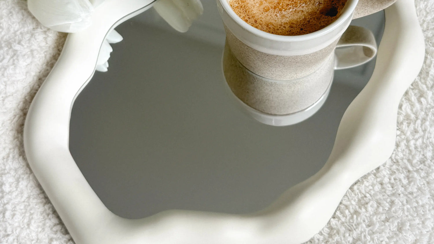 Instant coffee resting peacefully on a mirror